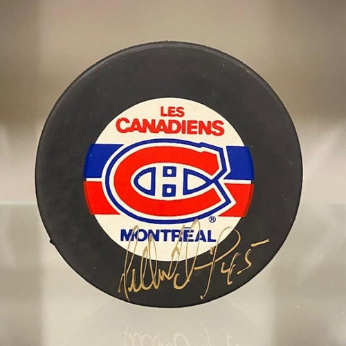 SIGNED Gilbert Dionne (Montreal Canadiens) Hockey Puck (w/COA)